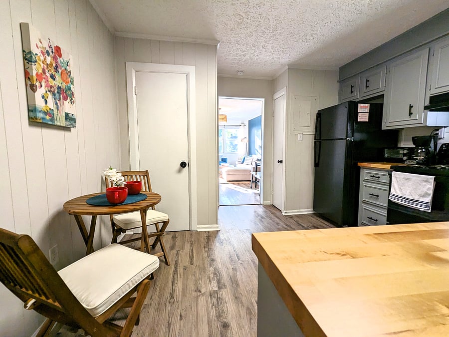The kitchen is large and flows seamlessly into the dining and living rooms.