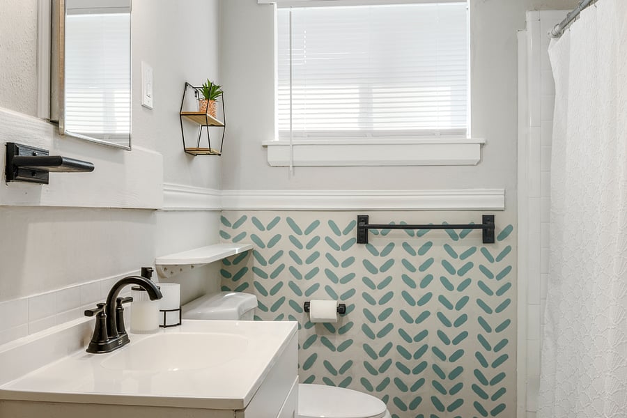 The bathroom is a light and bright place to get ready in the morning or wind down at night.