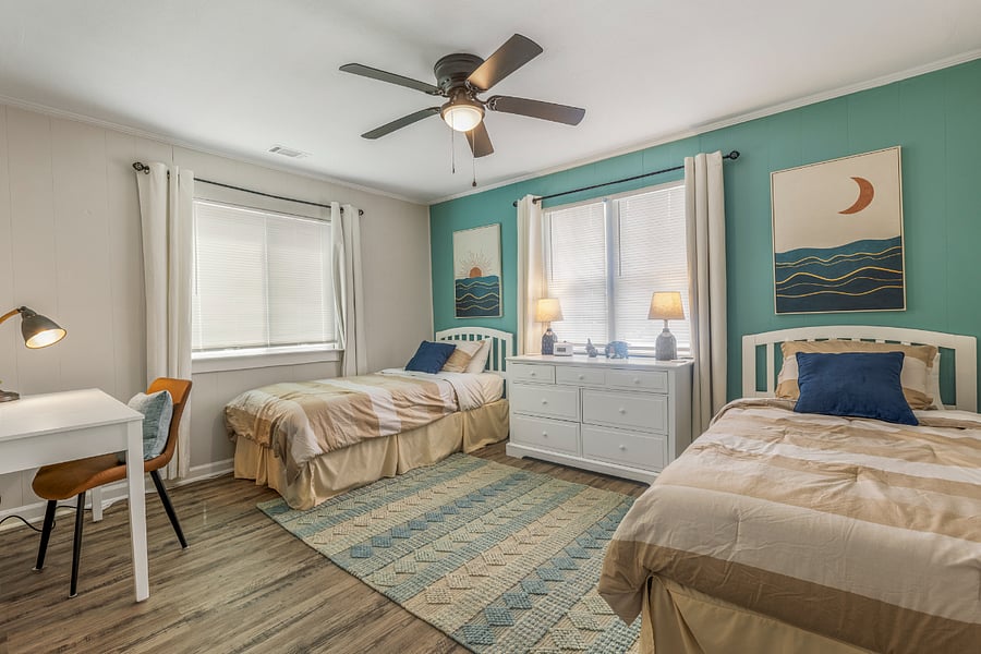The ample second bedroom has two twin XL beds so that adults or kids can be comfortable. The closet, dresser, and vanity/desk offer plenty of room for your belongings.