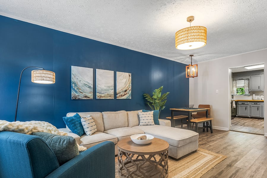 The open floor plan and plenty of lighting makes living easy and comfortable.