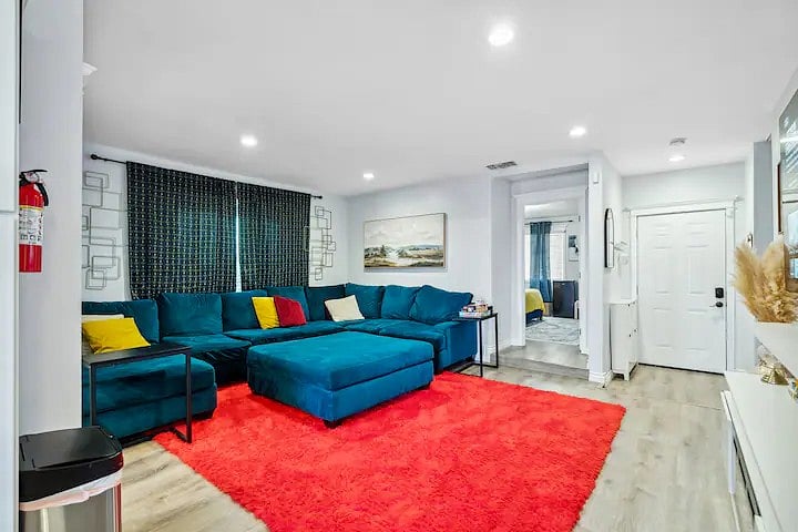 Bright, open, and welcoming, this stylish living space flows effortlessly into the rest of the home for a relaxed and inviting vibe