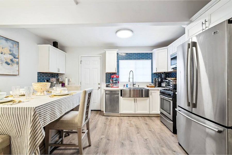 Gather around the table for meals or memories, this bright, open kitchen and dining space is perfect for everything from breakfast to board games.