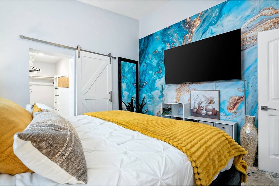Bold design meets modern comfort, watch your favorites on the big screen or get ready in the spacious walk-in closet.