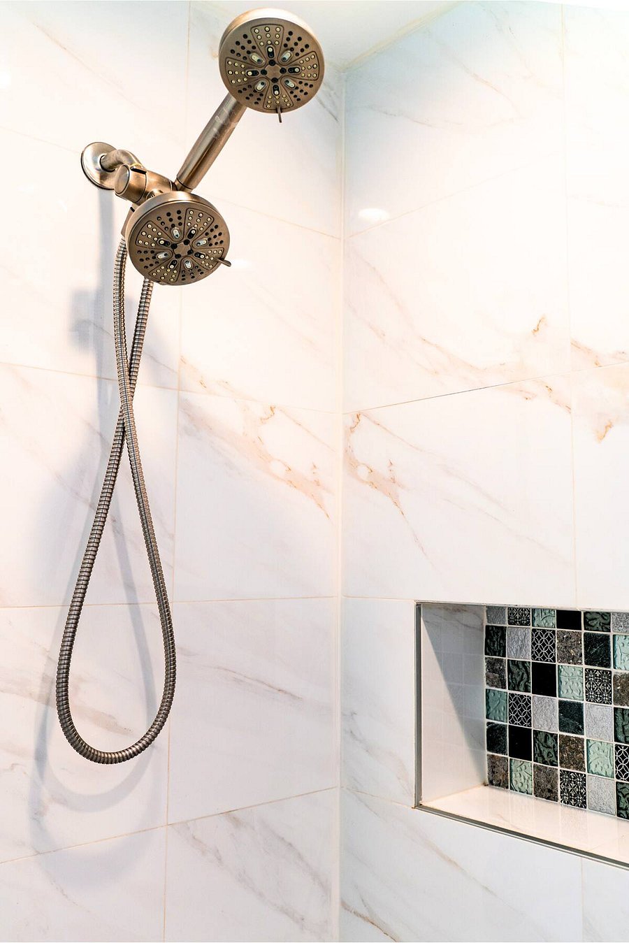 Enjoy a luxury rinse with our dual showerhead setup, perfect pressure and elegant tilework for a soothing start or end to your day