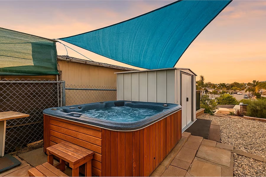 Unwind in the hot tub as the sun sets, perfect for a peaceful solo soak or a relaxing night under the stars.