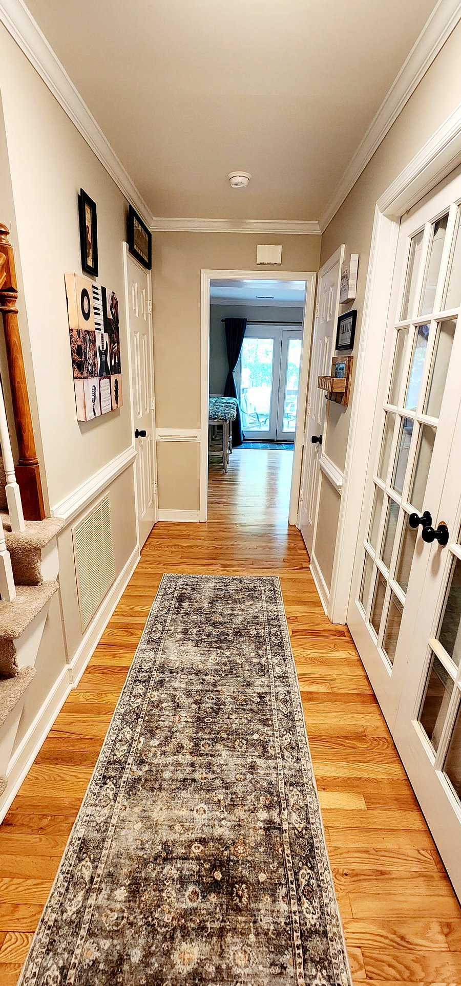 Front entry. There is a table in the hallway now though it'snot in the photo. My bedroom is the door on the right. The Tan Timber is on the left. Not shown in this photo. 