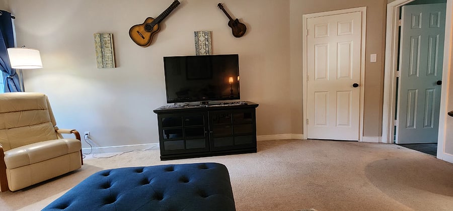 Upstairs familyroom has a large television, full bathroom, Firestick and access to an upstairs closet and bathroom. 