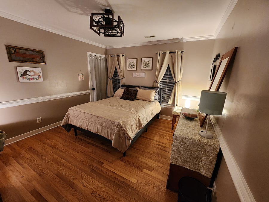 Front facing windows. The windows have miniblinds and black out curtains. 