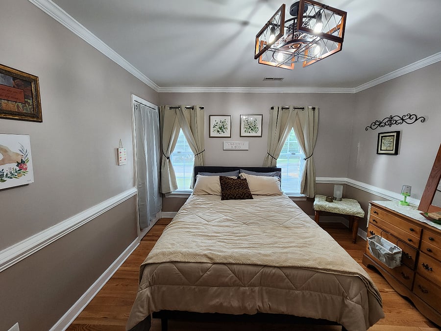 There is a keycoded door lock on the door in this photo. It leads to the front door of the home. There is a 2nd door that enters the kitchen. 