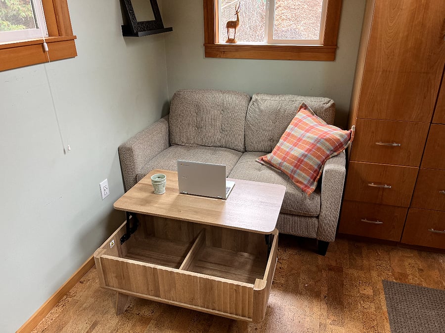 Loveseat with desk.