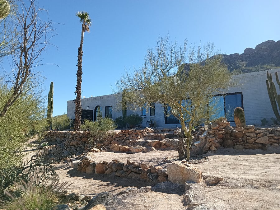 Front yard pictured with ample patio for relaxing and enjoying summer monsoons, sunsets and views. Designated patios for each unit. Front + rear patio tables