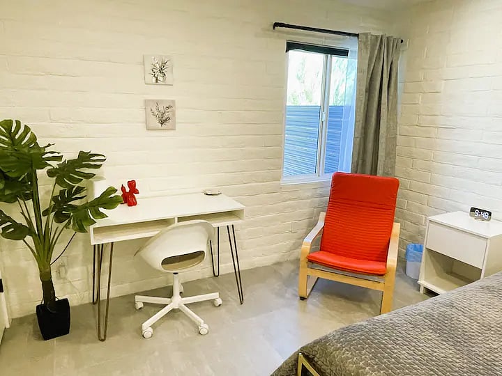 Bedroom with dedicated workspace