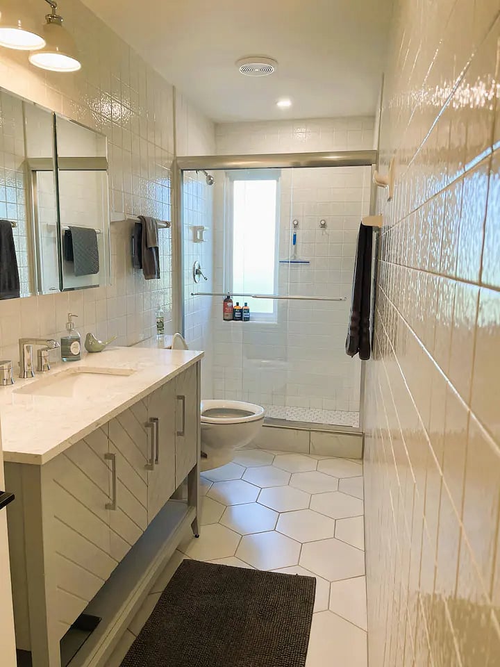Updated bathroom with all new fixtures, tile & paint.