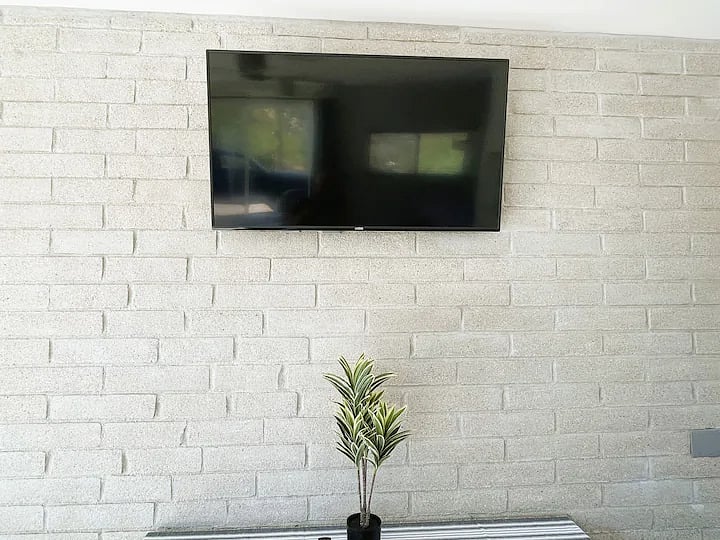 55'" Vizio Smart TV with Wi-Fi. No cable. Smart TV allows guests to log onto apps for streaming
