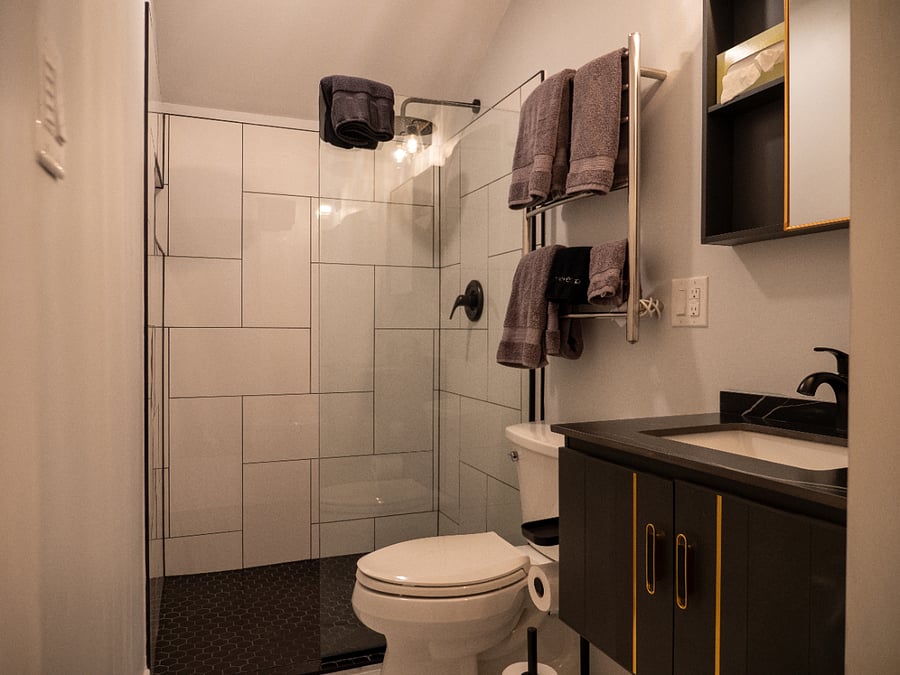 Private en suite Bathroom for Room #3. Featuring a walk-in shower & heated towel rack. No Windows