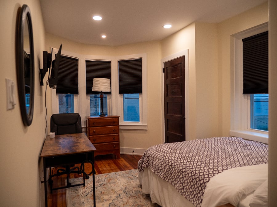 Room #1. Full bed, work station, Smart TV, bureau, & closet