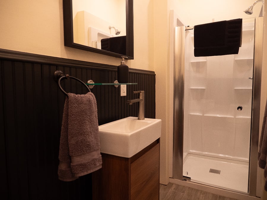 Full Bathroom #1 on 1st Floor. Toilet, Shower, & Sink. No Windows