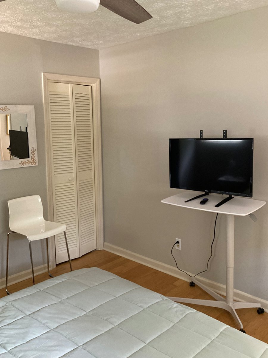 Roku TV in Bedroom with Queen bed