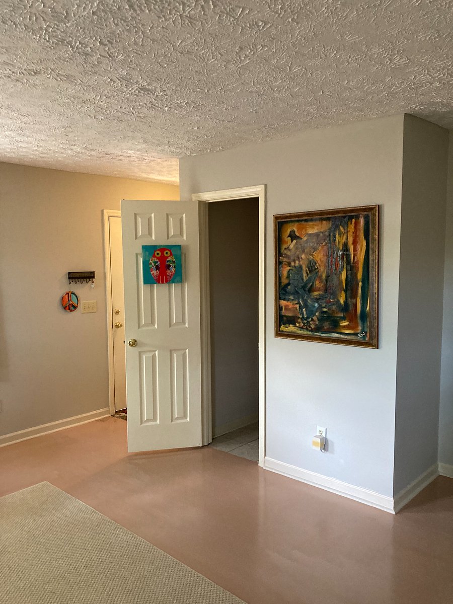 Door to half bath in livingroom