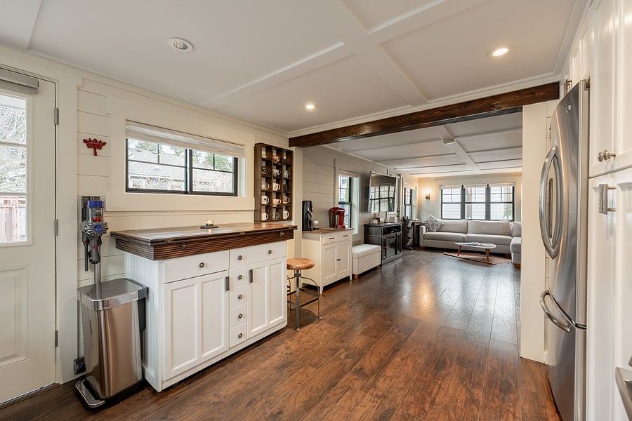Open layout keeps the kitchen connected to the living space while preserving plenty of room to move around.
