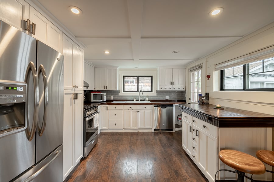 Thoughtfully designed kitchen with extensive storage, including convenient pull-out cabinetry.