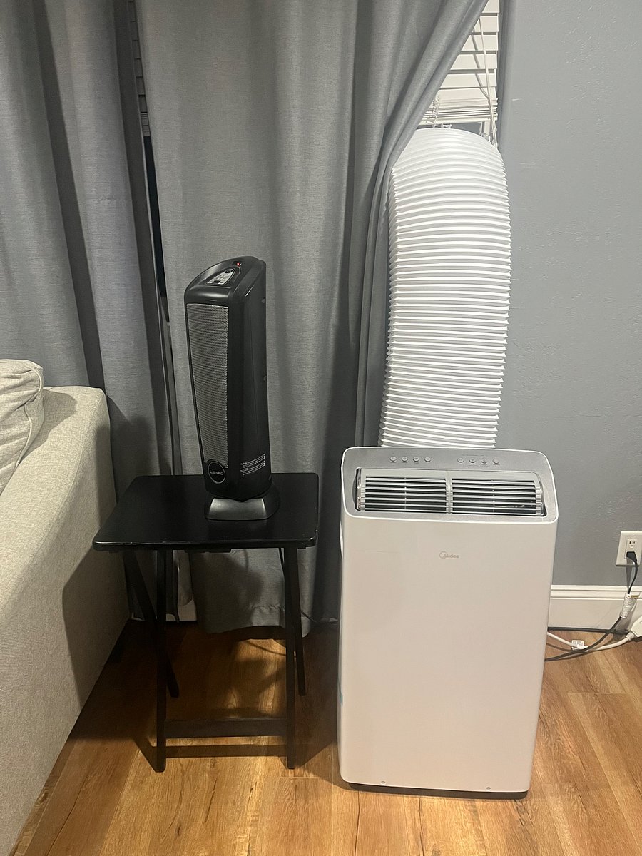 The room has portable AC and heater