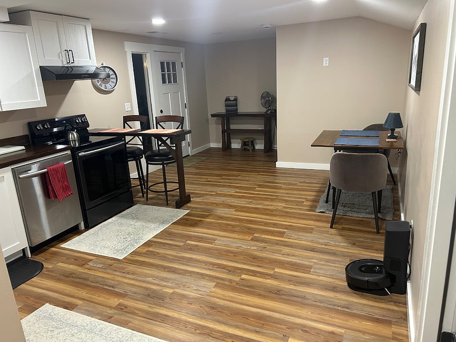 View from Queen room toward entry door. Roomba vacuum