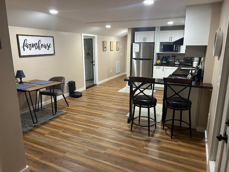 View from entry door and king room. Open door leads to laundry room
