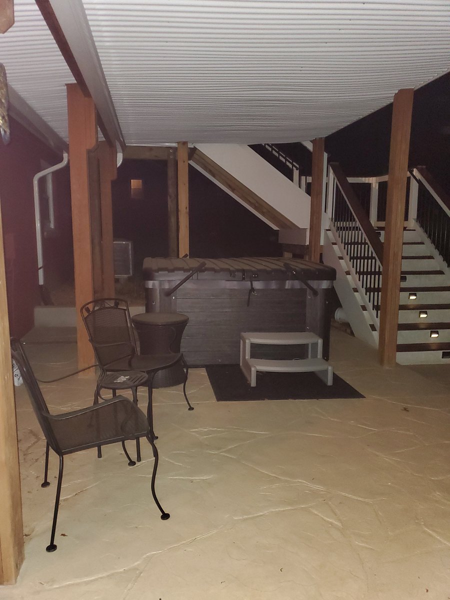 Hot tub, shared space, covered porch with fire pit and picnic table accessible