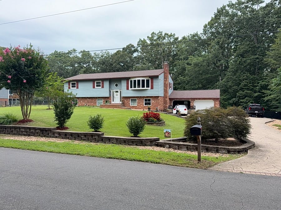 Private garage space, extra wide driveway for additional parking and plenty of private street parking in front of home.