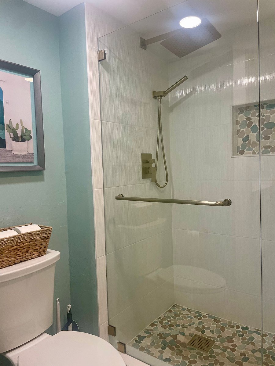 Large master bath shower with large rain shower head.