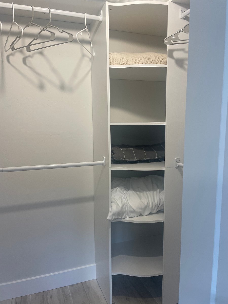 Large walk-in closet in guest bedroom.