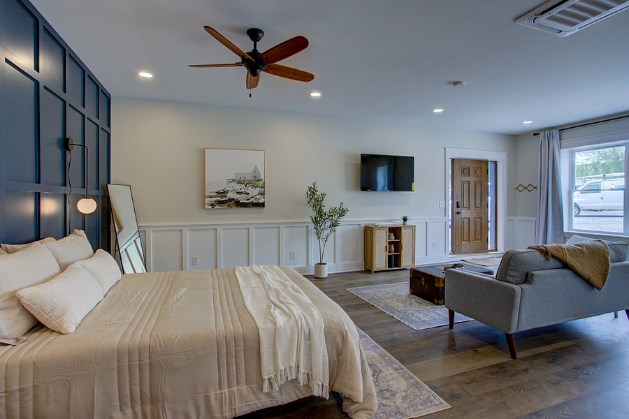 Custom finishes like paneled wall and wainscoting make for high style