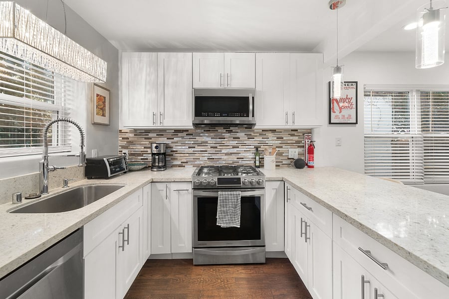 Kitchen features Samsung Chef Collection appliances