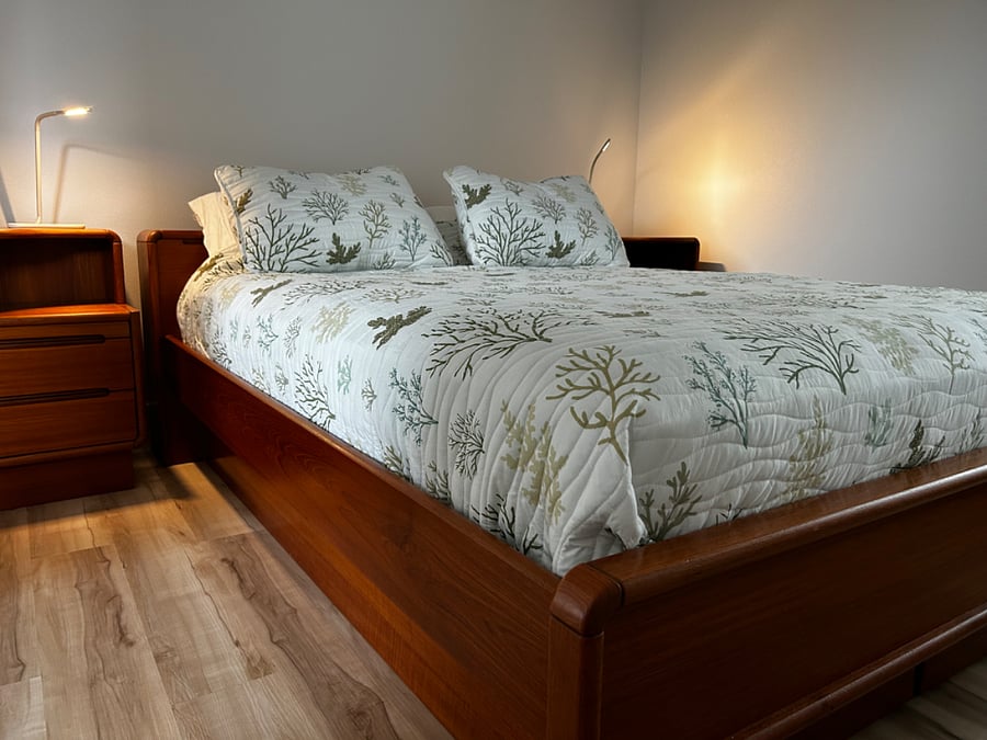 Super comfy queen sized Stearns & Foster bed with teak wood frame and nightstands. Headboardand nightstands have extra storage space.
