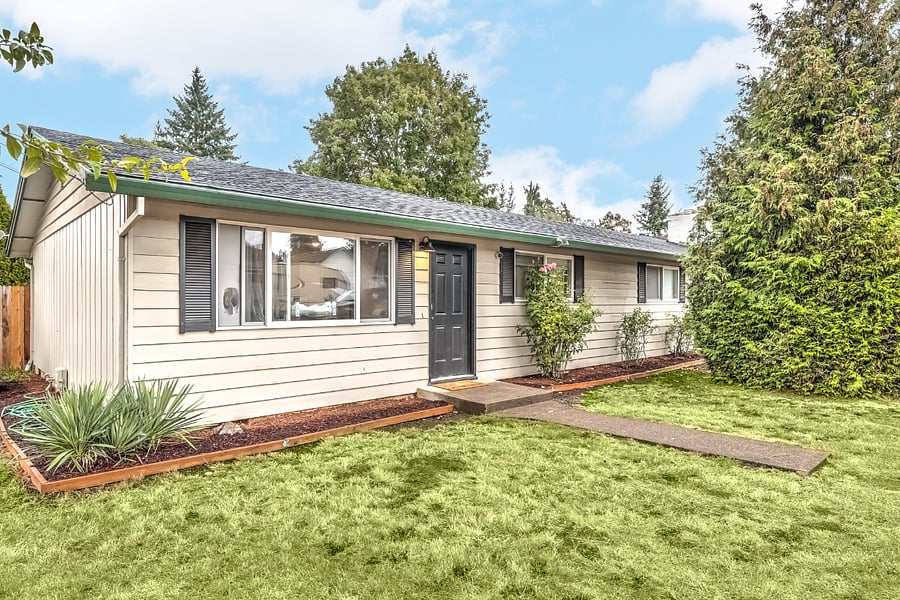 Corner one story unit with parking in front of property
