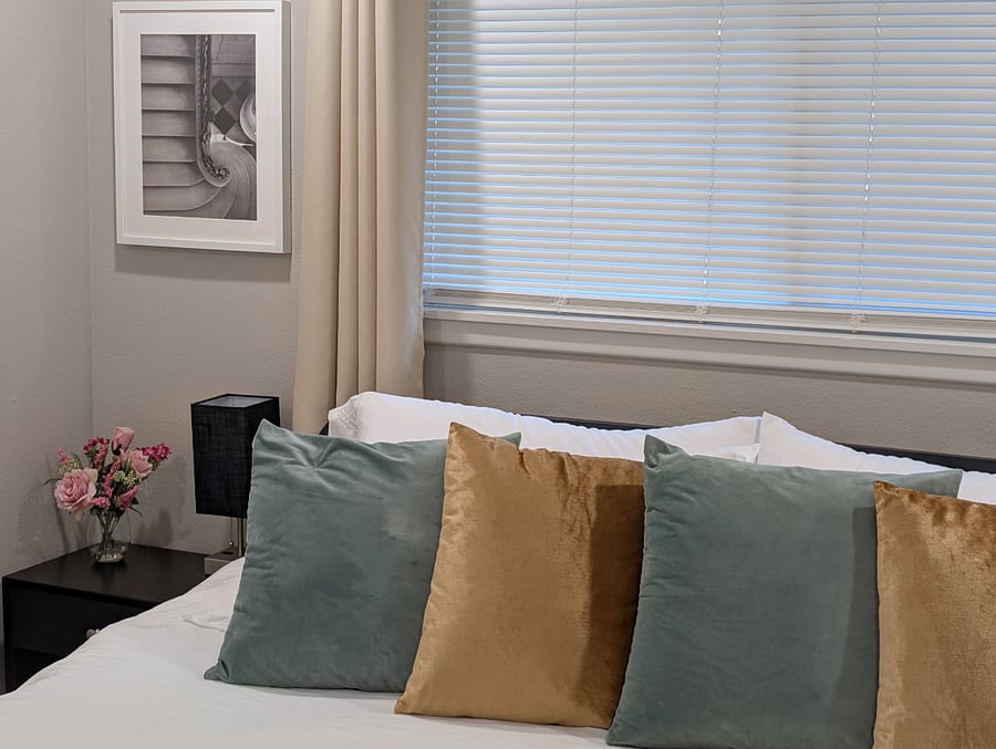 Blinds and blackout curtains in bedrooms