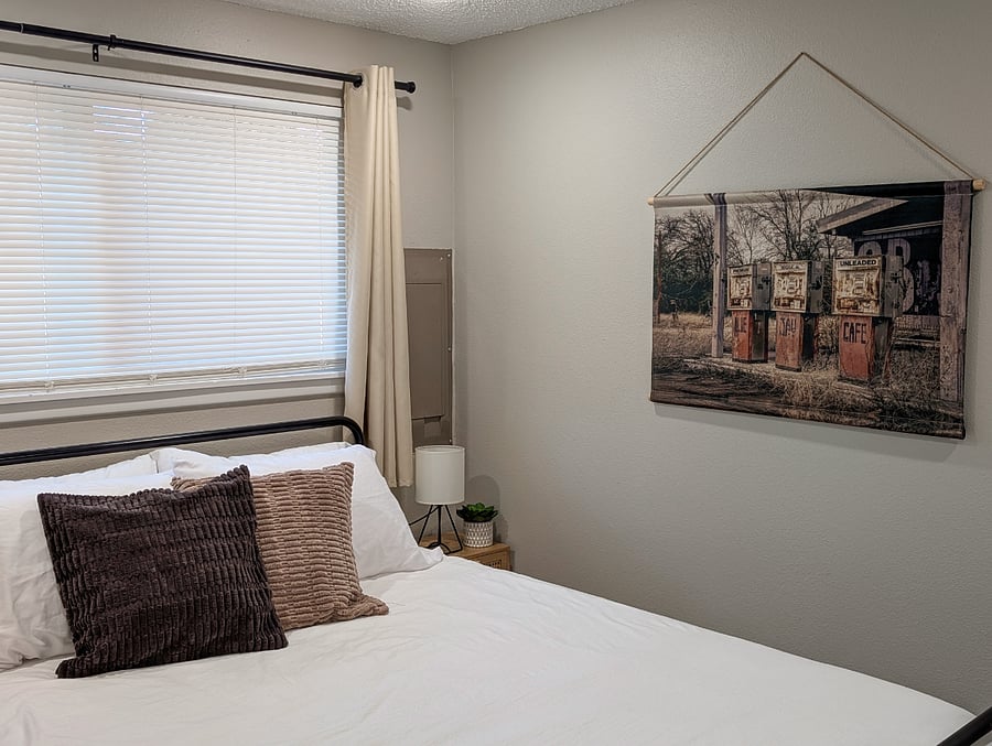 Blinds and blackout curtains in both bedrooms