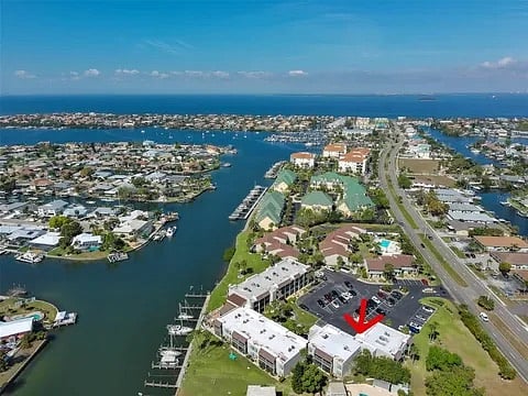 Aerial view of condominium complex located on a canal off of Tampa Bay.