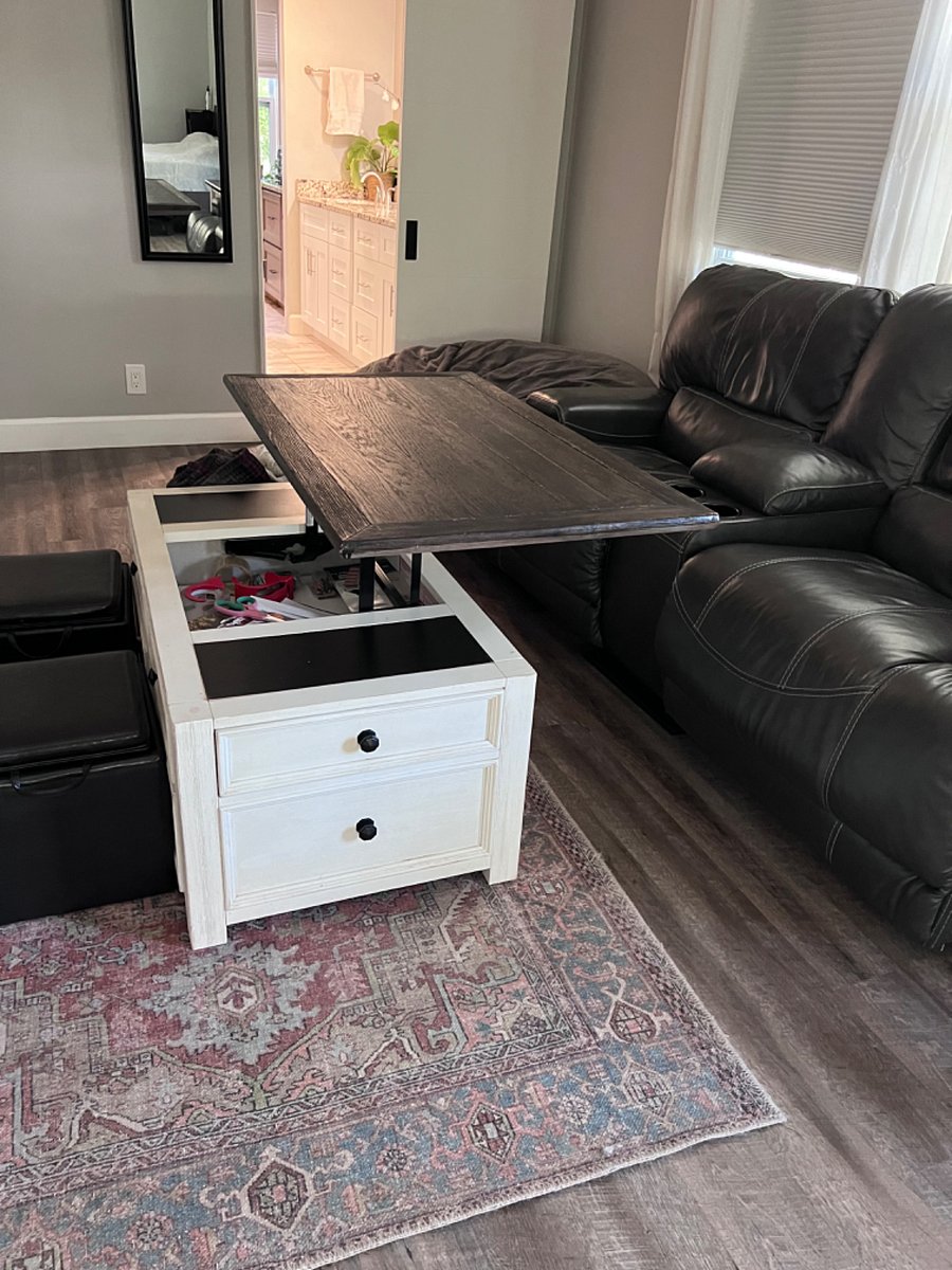 Living area with a lift top coffee table