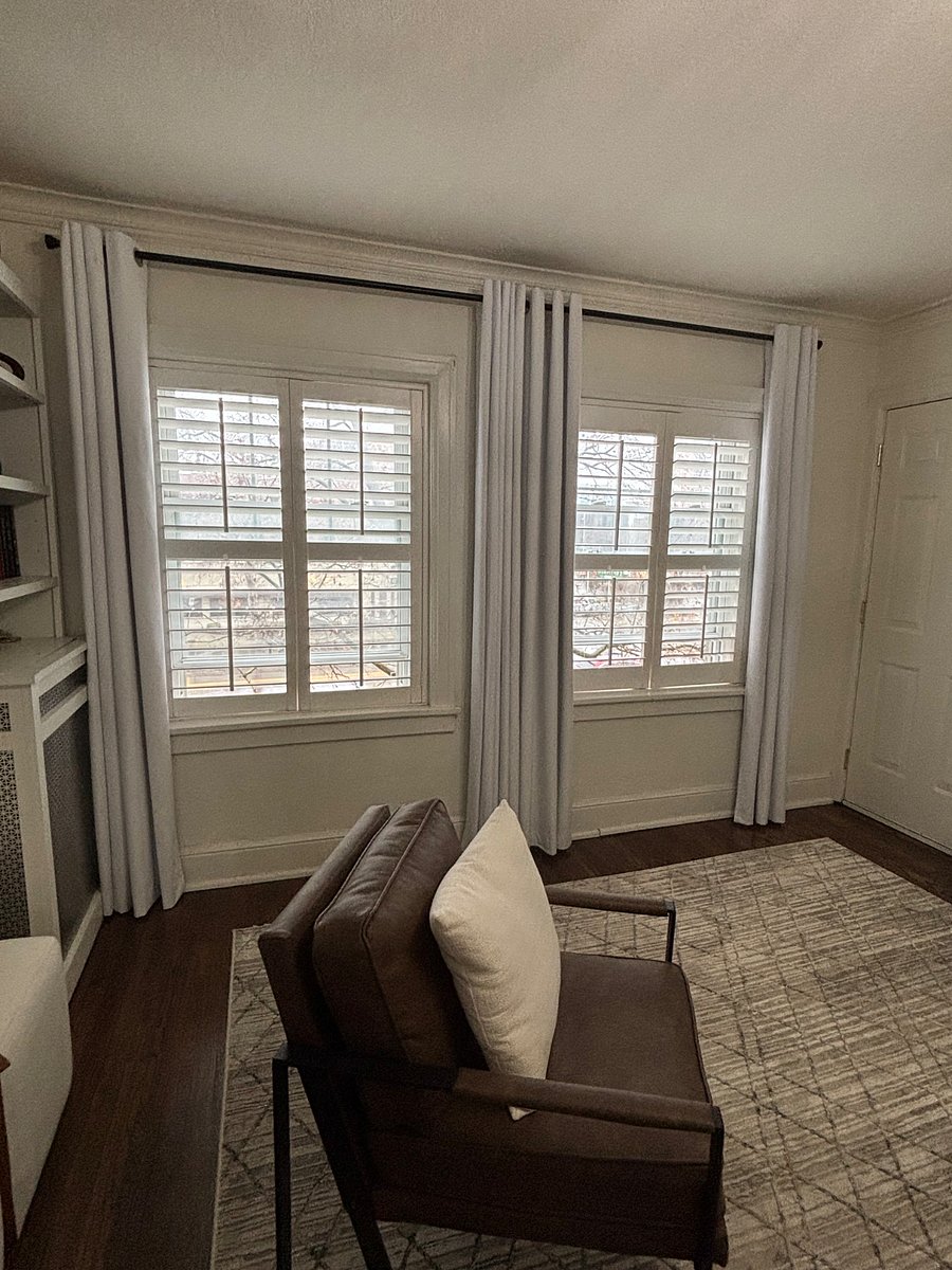 Black-out curtains in Living room to block excess light and sound.