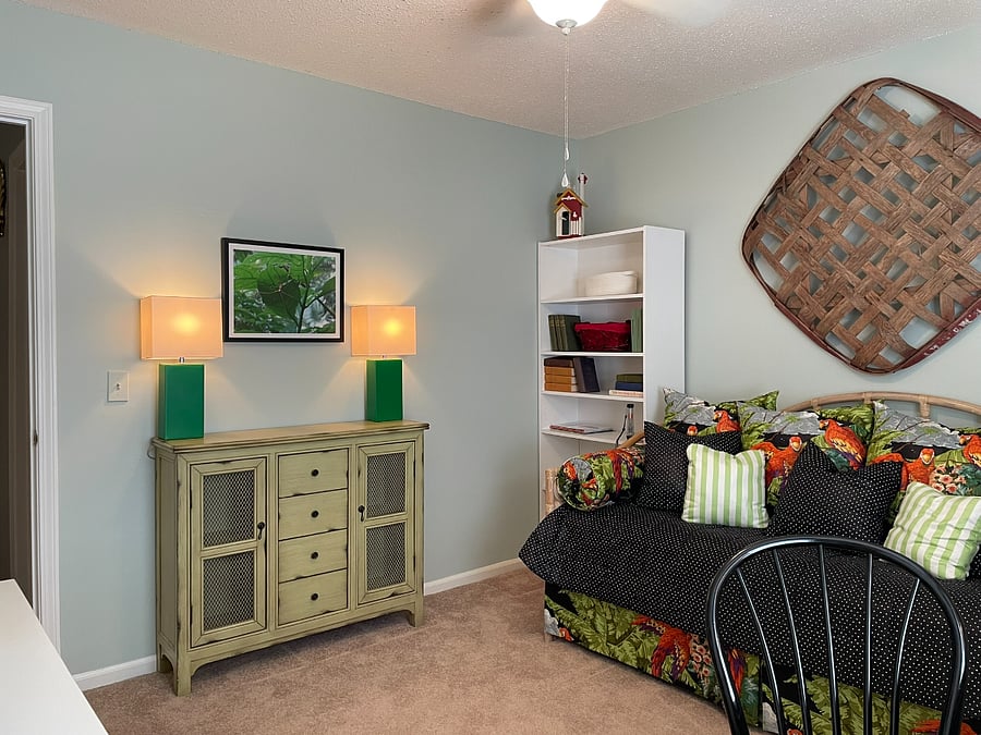 Second Bedroom comes with a twin day-bed and second twin trundle underneath. The space also includes (2) desks for space to work and plenty of storage