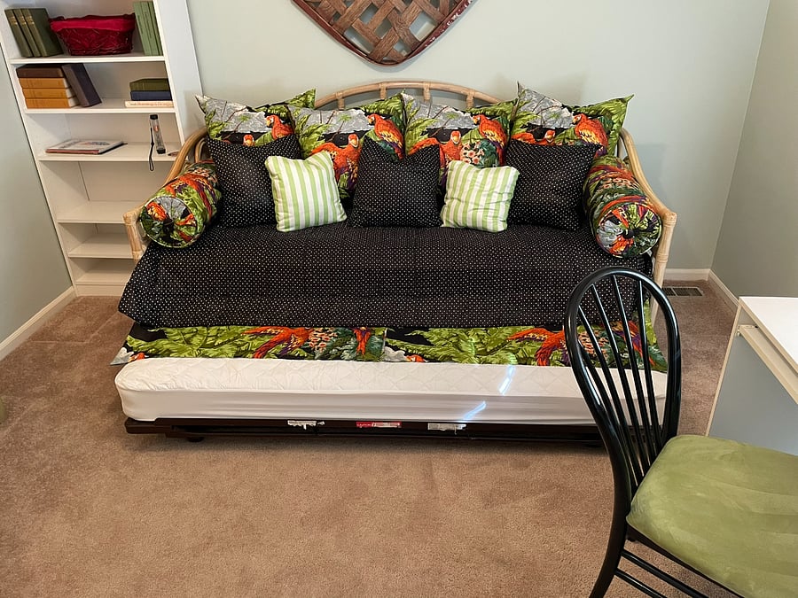 Second Bedroom comes with a twin day-bed and second twin trundle underneath. The space also includes (2) desks for space to work and plenty of storage