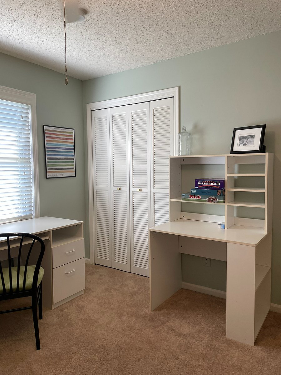 Second Bedroom comes with a twin day-bed and second twin trundle underneath. The space also includes (2) desks for space to work and plenty of storage