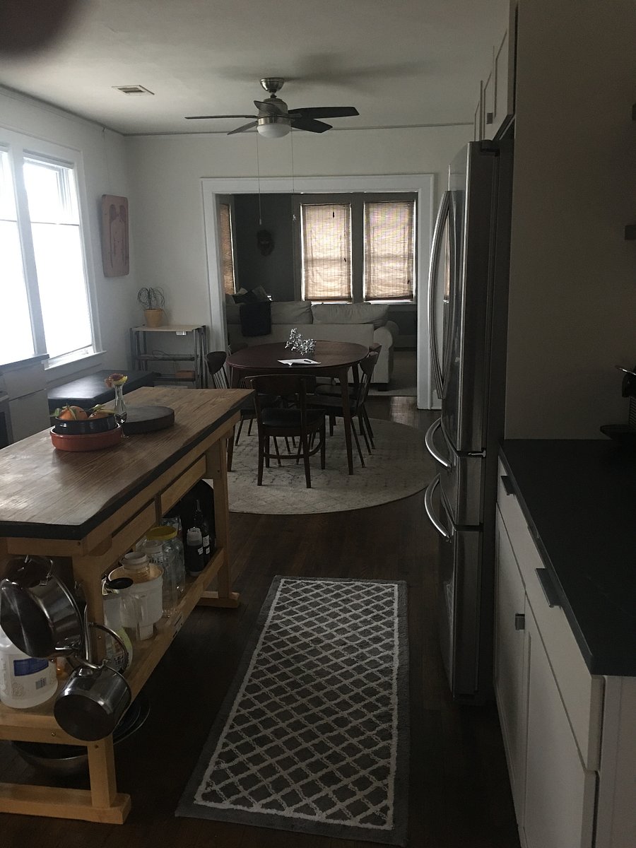 Original hardwood floors and oval table seats 4-6 with leaf.