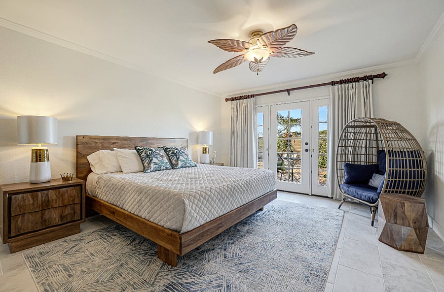 Primary Bedroom with King Bed and yard access and Walk in closet