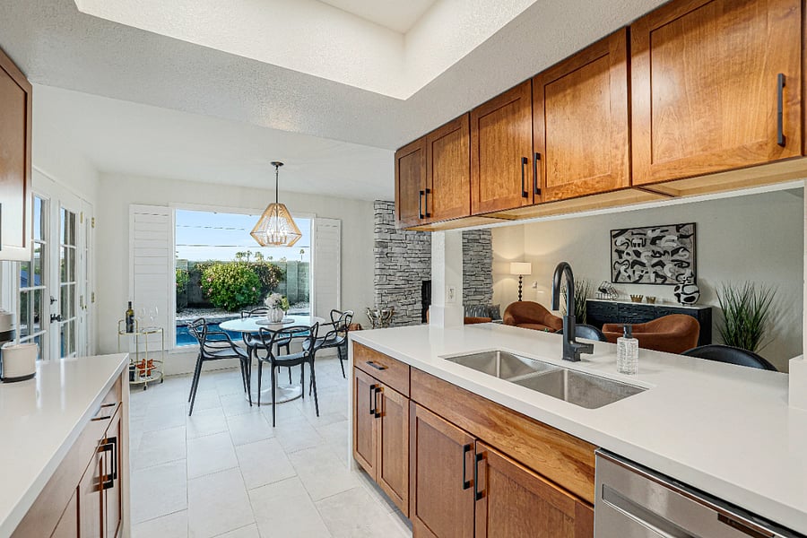 Kitchen with Quartz Countertops and full height backsplash, waterfall edges, stainless appliances, fully stocked with all dishes and cookware and appliances