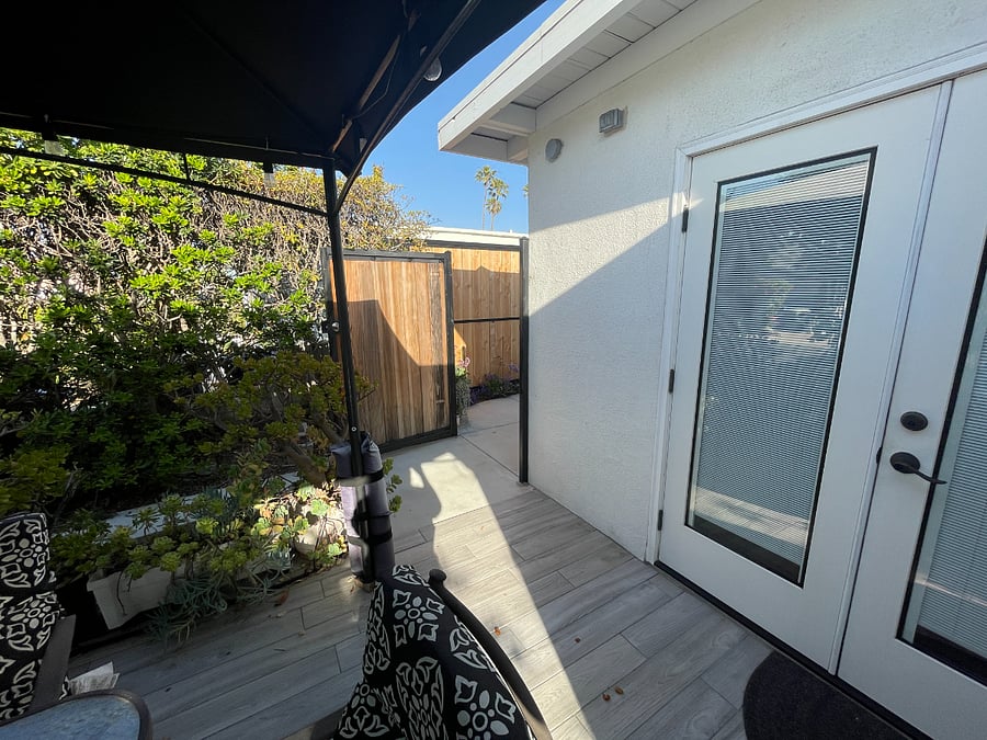 Front Gate to Side Yard, Laundry Room and Rear Parking