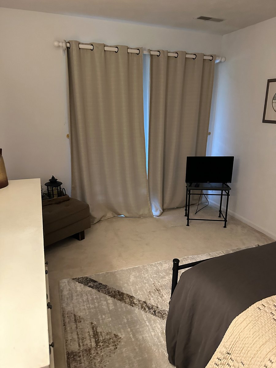 Lower level bedroom queen bed
