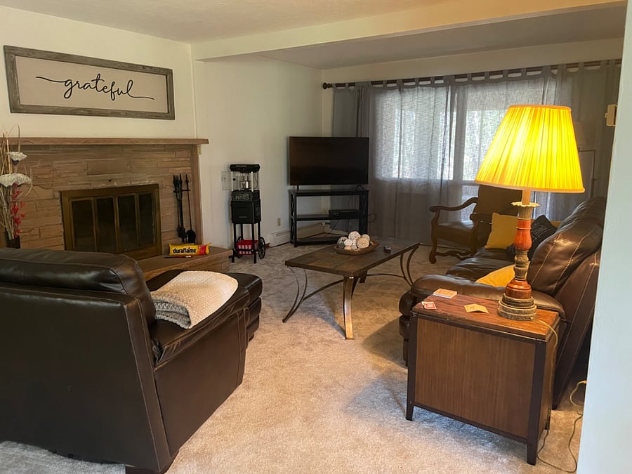 Cozy living room with fireplace.